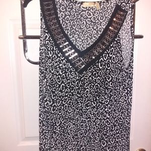 Short sleeve silk material shirt.